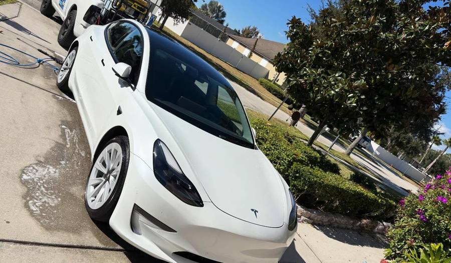 White Tesla Model 3 freshly detailed in the 727